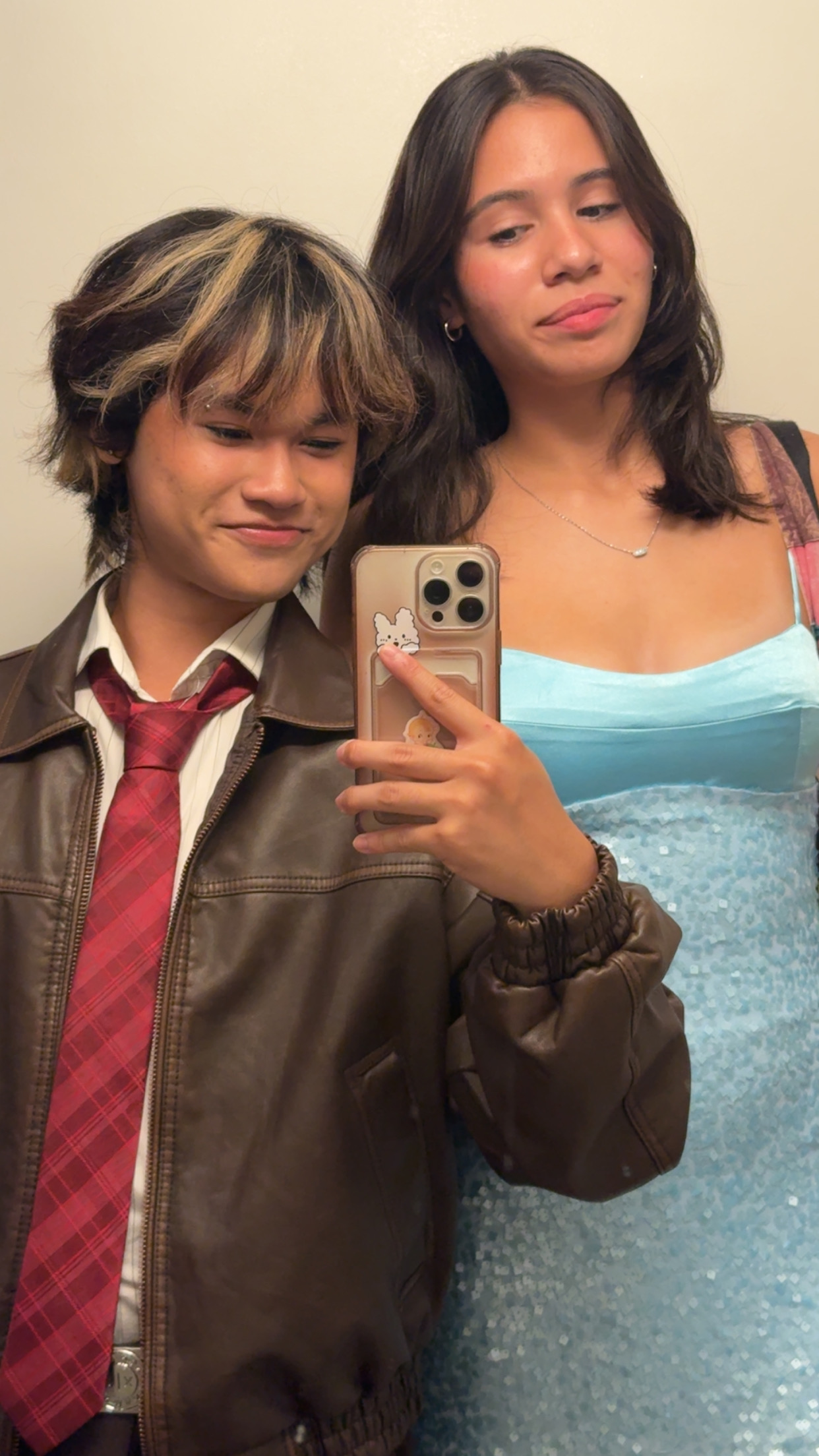 Picture of me and my friend before 
    homecoming